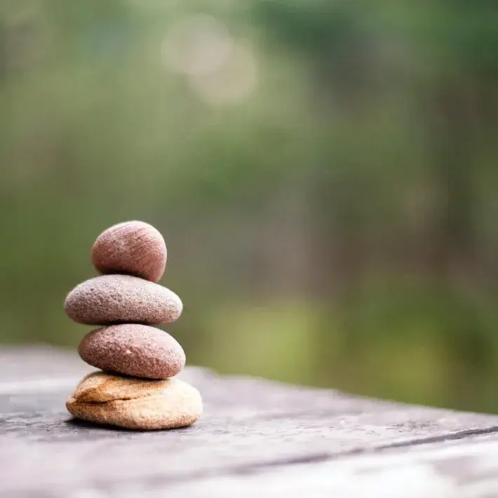 Balanced - Stacked balancing pebbles in nature